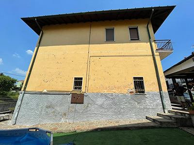 facciata-villa-schiera-carbonate 1